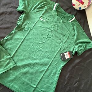 Nike women’s Emerald Green Short-Sleeve Soccer Jersey with White Swoosh